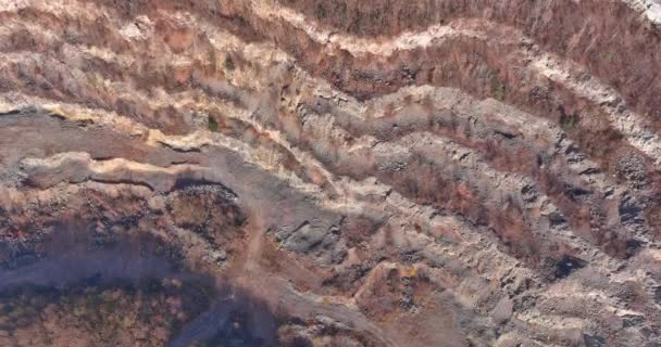 Panorama of the relief a large stone quarry for the opencast mining extraction — Stockvideo