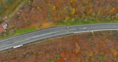 Aerial view over road in the middle of a valley beautiful landscape
