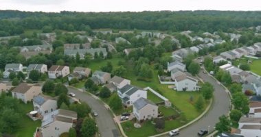 Aerial over top view seasonal American suburban area landscape beautiful small green town in East Brunswick New Jersey US