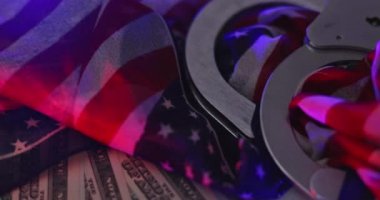 Criminal corruption handcuffs money of light flasher police