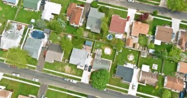 View top aerial in small american town in Bensalem Pennsylvania of urban rooftops