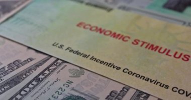 Stimulus financial a bill individual checks from government US dollar bills currency in Global pandemic Covid 19 lockdown