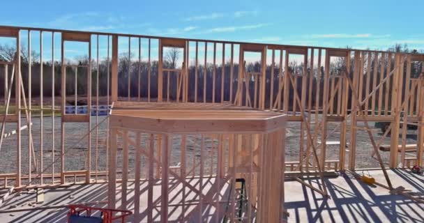 Aerial view of wood framework a new wooden house under construction — Stock Video