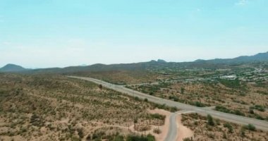 Panorama view Hwy US 87 interchanges highways along desert landscape in mountain Arizona