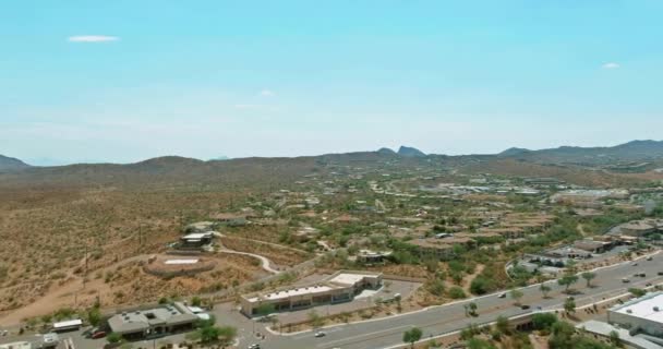Overlooking view of a small town a Fountain Hills near mountain desert US 87 interchanges highways of in Arizona USA — Video