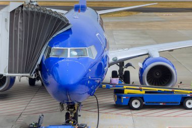 Luggage many suitcases when loaded on an airplane