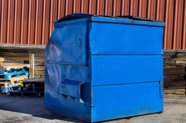 Garbage bins being full garbage with container