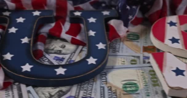 Business nationalism concept with stack of money on American Flag — Stock Video