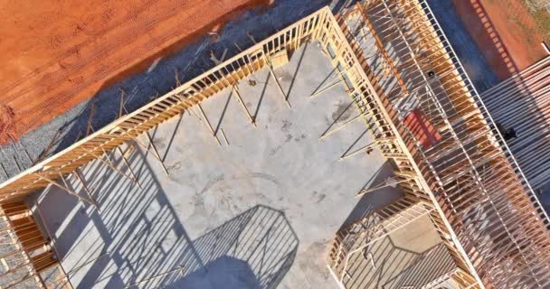 Aerial view of framing beams stick built new home under construction — Stock Video