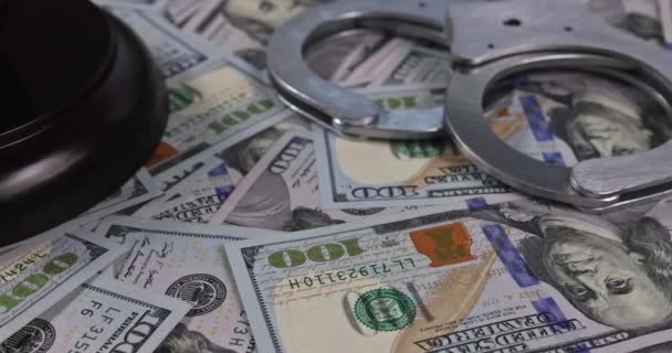 Financial regulation of american economic sanctions with US dollars banknotes handcuffs Judge gavel — Stock Video