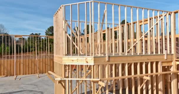 Framing beams stick built home under construction under framing structure wood frame building construction — Stock Video