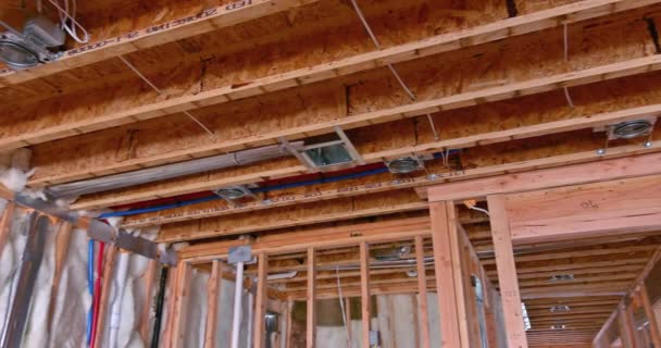 Wooden beams ceiling framed building residential home construction interior — Stock Video