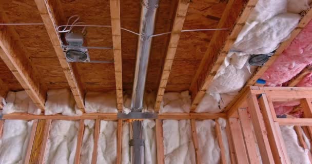 Framing beams stick built home under construction under framing structure wood frame building construction — Stock Video