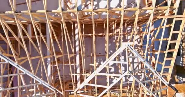 Timber frame house stick built home under construction new build with wooden truss, beam framework — Stock Video