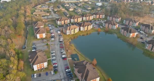 Panorama over viewed residential apartment buildings quarter area urban development residential near small pond in Denham Springs Louisiana US — Stock Video