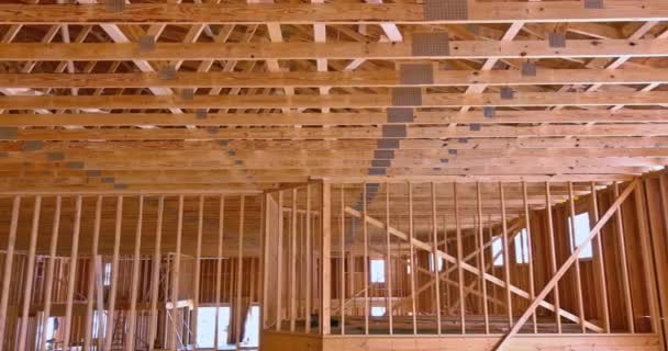 Wooden detailing of the interior view roof trusses a timber frame home — Stock Video