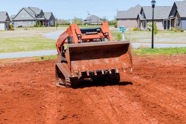 Bulldozer performing landscaping works the territory improvement — Stock Photo, Image