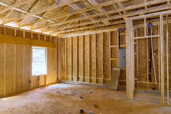 New stick built building view framing of beams on new home under construction — Stock Photo, Image