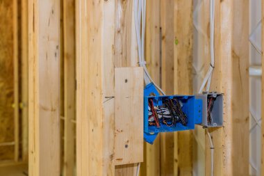 Installing electric sockets on the wall new home new home construction