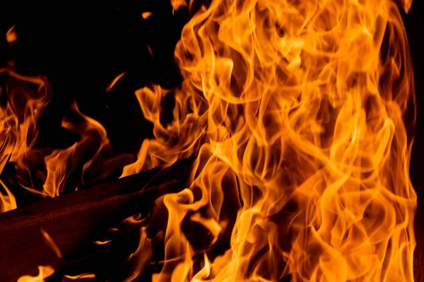 Closeup view on the burning wood in a fireplace — Fotografia de Stock
