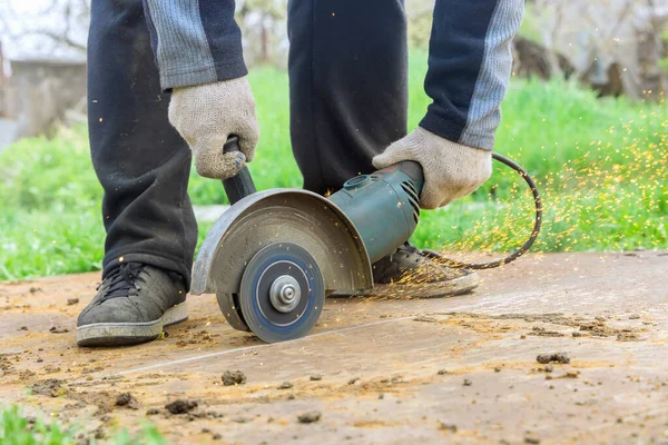 Angle grinder and cut steel sheet hand electric power tools — Stockfoto