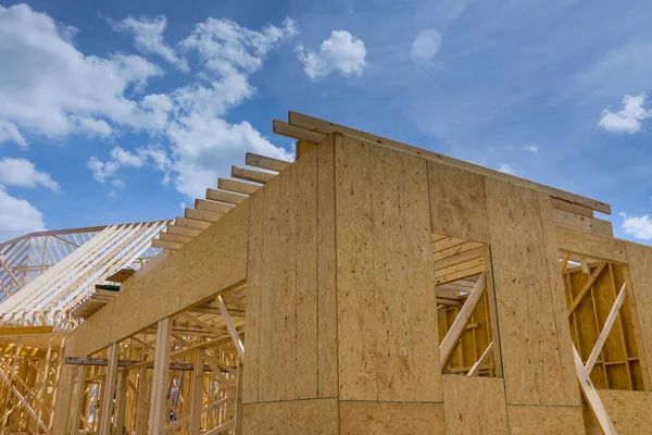 Exterior view of a new house under construction framing — Stock Photo, Image