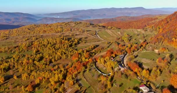 View from a height of the mountains on a sunny autumn morning — Stockvideo