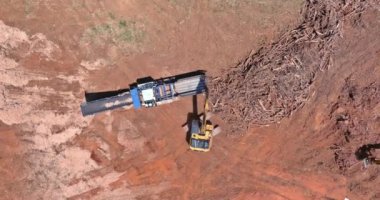 Aerial view on processing facility large industrial wooden chip conveyor of stationary industrial wood shredder