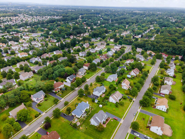 Aerial view over suburban homes an small town in New Jersey USA