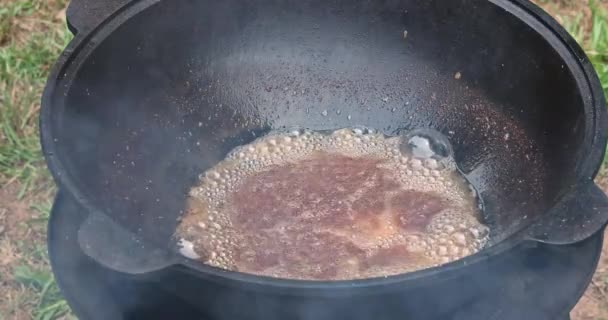 Meat Cooking Chicken Wings Open Fire Cauldron Boiling Oil — Stock Video