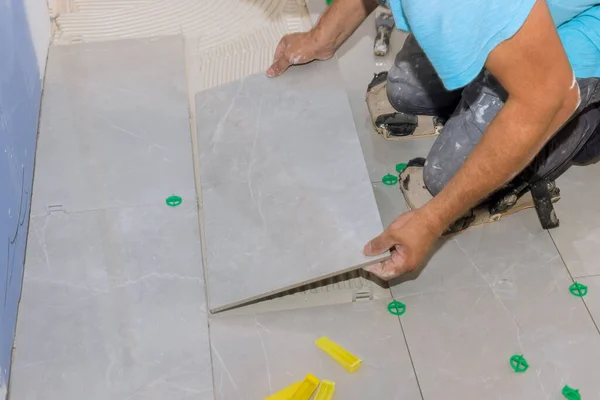 Placing Ceramic Tiles Glue Smeared Floors Using Tile Adhesive Construction — ストック写真