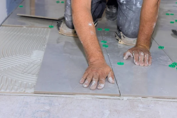 Placement Ceramic Floor Tiles Adhesive Surface Home Bathroom Construction Workers — Foto de Stock