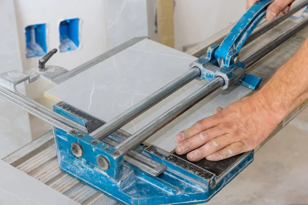 Construction Worker Cuts Ceramic Tile Floors Using Manual Tools Equipment — Fotografia de Stock