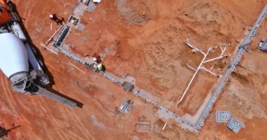 A concrete mixer truck was used to pour concrete columns for a new house an top view
