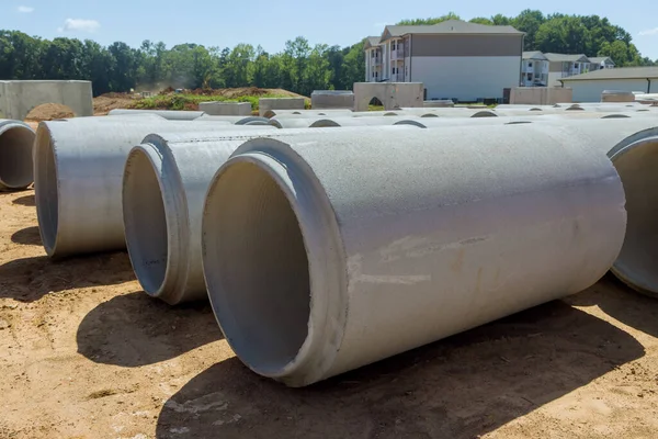 Construction of the large cement sewage pipes for industrial buildings, concrete pipes are used to construct drainage systems in construction site