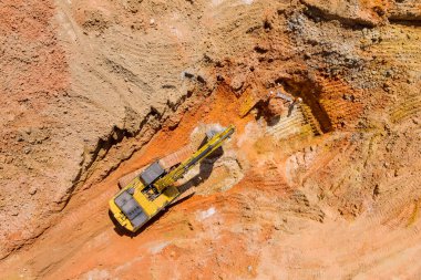 In order to lay underground storm sewer pipes, the excavator digs pit to connect the sewer system