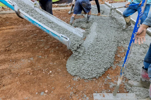 Assisting Pouring Cement New Concrete Driveway Construction Site —  Fotos de Stock