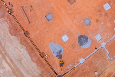 Preparations for pouring the concrete foundation for a new building in construction site