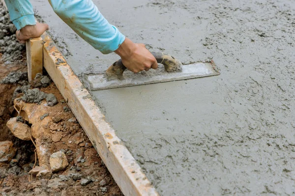 Currently Worker Holding Steel Trowel Smoothing Plaster Freshly Poured Concrete — Stok Foto