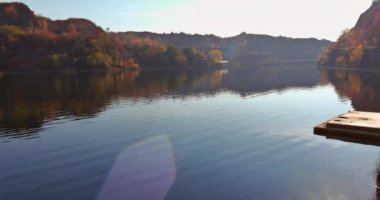 This artificial quarry contains an azure water surface and picturesque flooded areas exuding the picturesque feeling of an abandoned quarry