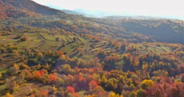 During the autumnal period of the year, a panoramic aerial view of mountain landscape can be seen