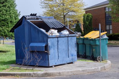 Garbage container bin household waste near apartment building