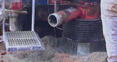 Portable hydraulic water well drilling rig with water extraction on a private plot of land