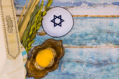 Traditions Jewish holiday celebration of Sukkot amassed with the symbolic elements of etrog, lulav, hadas, and arava