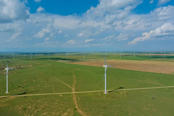 The wind power electricity farm in Texas USA has a row of wind turbines that are used for renewable energy generation