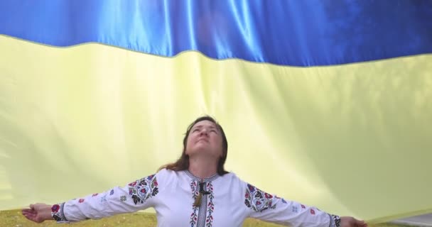 Young Woman Holds Flag Ukraine Raising Her Head Heaven While — Stock Video