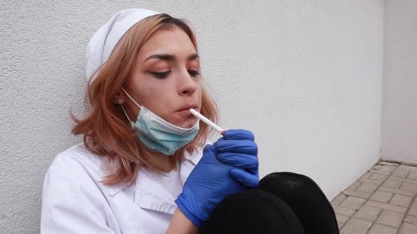 Dirty Tired Exhausted Nurse Ash Face Sitting Hospital Infirmary Smoking — Vídeos de Stock