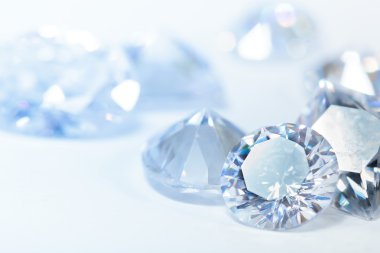 White diamonds on blue background clipart