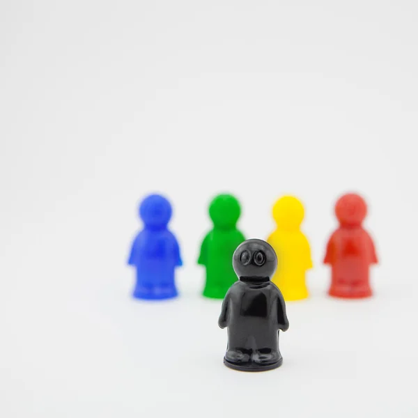Colorido plástico juguete personas sobre fondo blanco —  Fotos de Stock