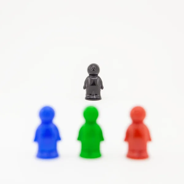 Colorful plastic toy people on white background — Stock Photo, Image